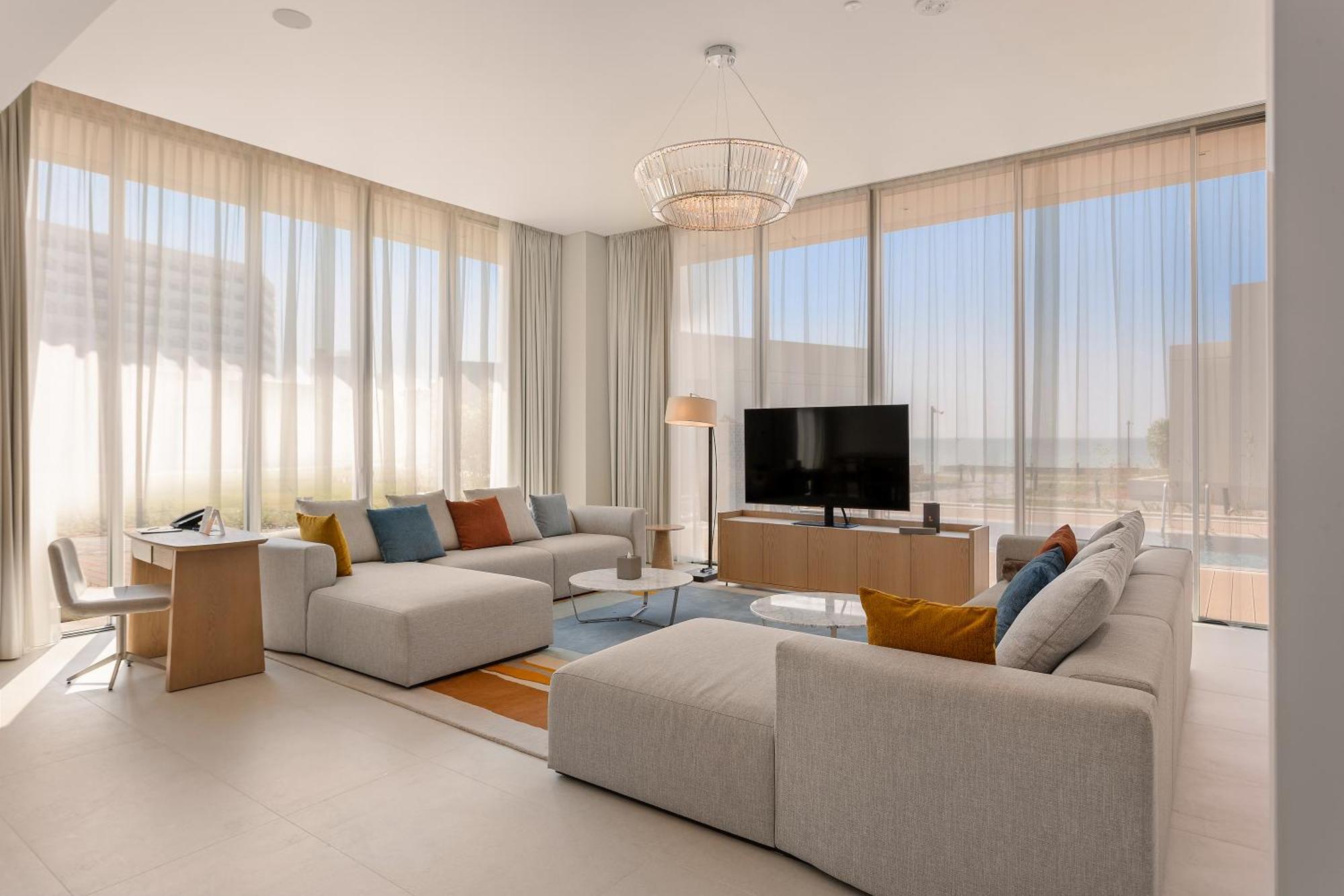 Ajman Hotel & Villas By Blazon Hotels Exterior foto The living room of a three-bedroom villa at The Edition