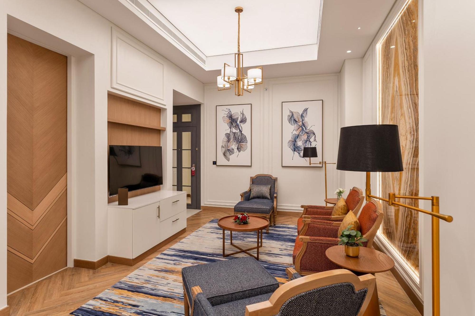 Ajman Hotel & Villas By Blazon Hotels Exterior foto A living room in a suite at the hotel