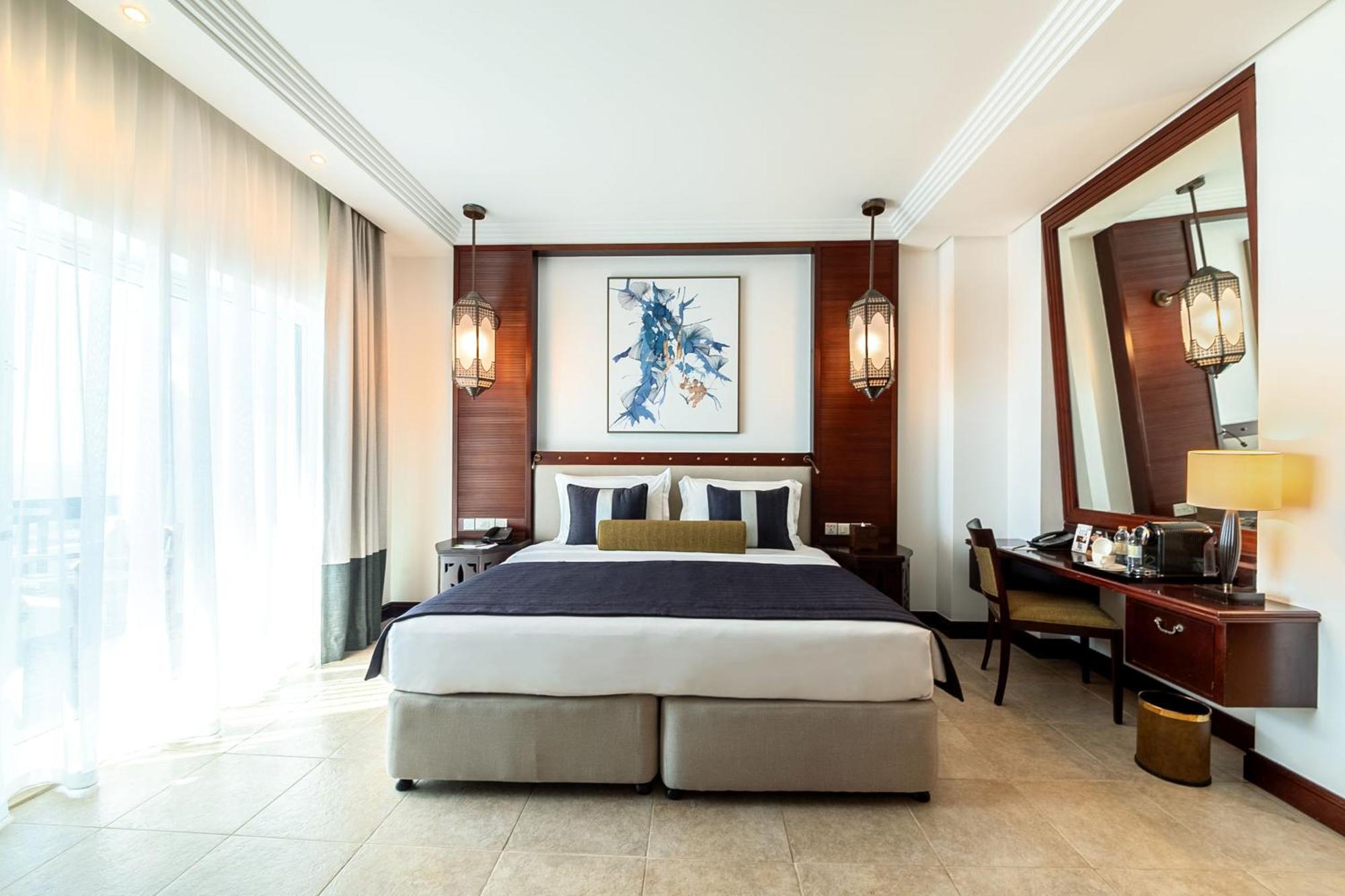 Ajman Hotel & Villas By Blazon Hotels Exterior foto A bedroom at the hotel
