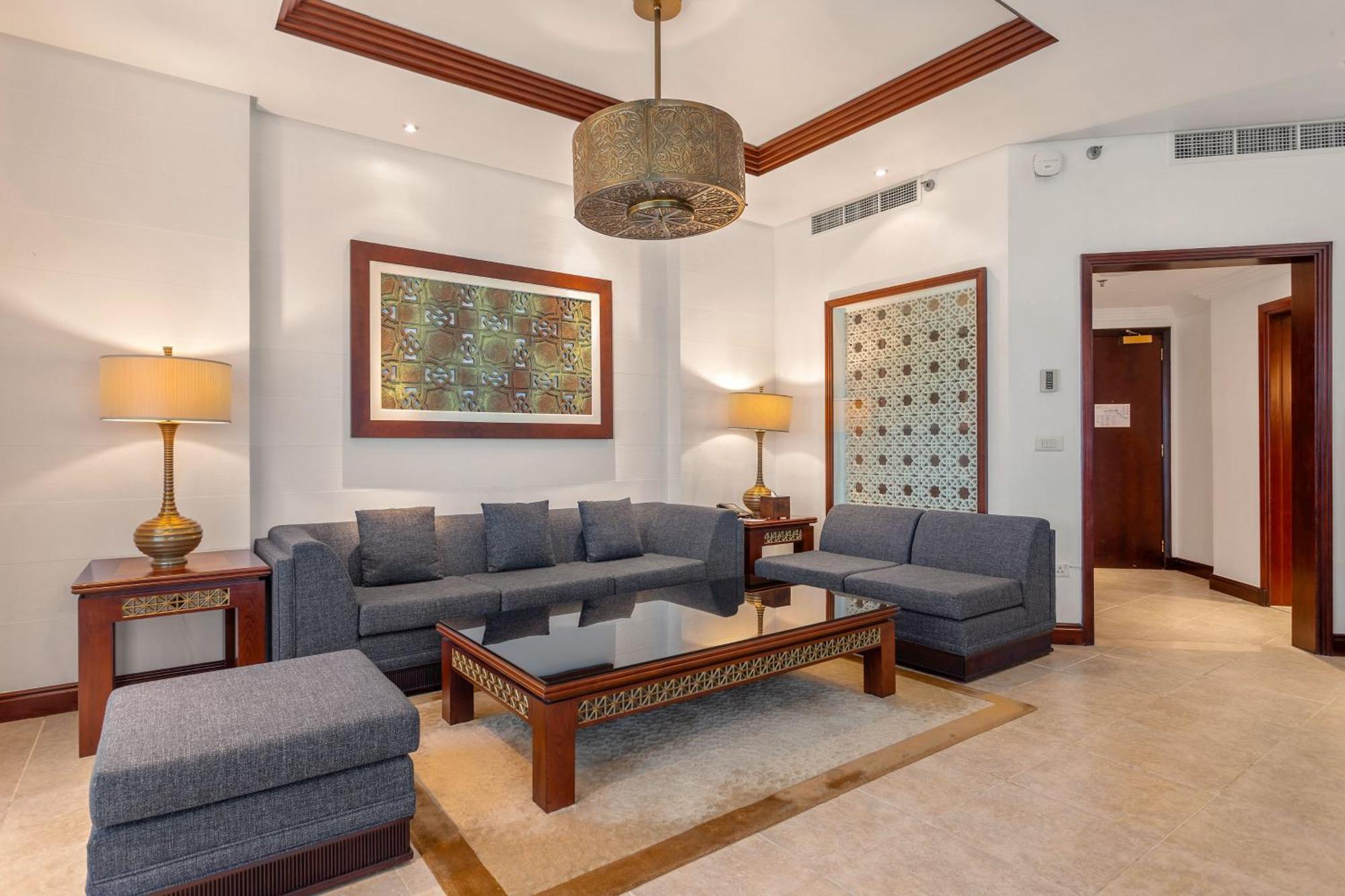 Ajman Hotel & Villas By Blazon Hotels Exterior foto A living room at the hotel