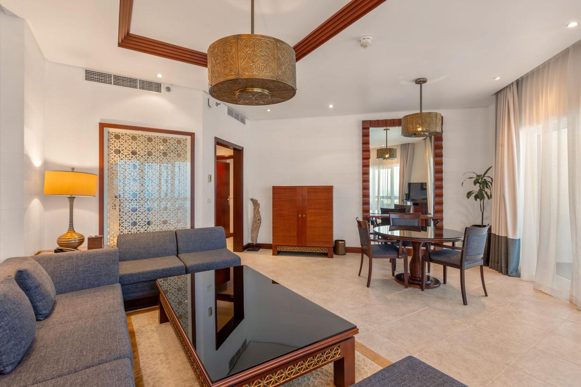 Ajman Hotel & Villas By Blazon Hotels Exterior foto A suite at the Ritz-Carlton, DIFC